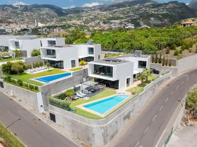 an aerial view of a house with a swimming pool at Luxury Diamond House by Holiday Rental Madeira in Funchal