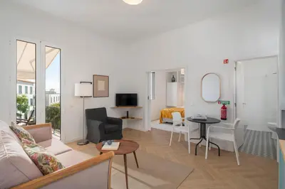 a living room with a couch and a table at Bela de Santiago I by An Island Apart in Funchal