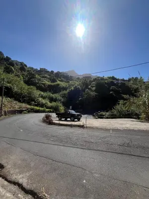 a truck parked on the side of a road at Revived in Porto da Cruz