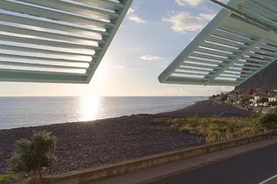 a view of the ocean from a building at Casa da Madalena do Mar in Madalena do Mar