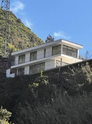 a house on top of a hill at Cardais Paradise View in São Vicente