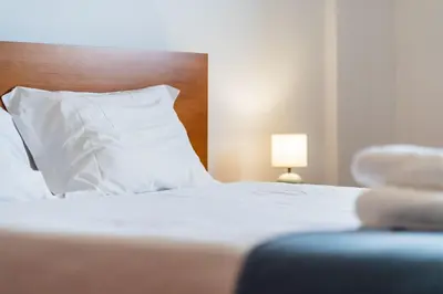 a bedroom with a bed with a towel on it at GuestReady - Lovely Getaway in Caniço in Caniço