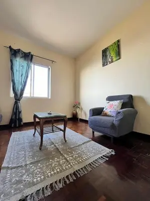 a living room with a couch and a coffee table at El Atardecer del Norte in Salão