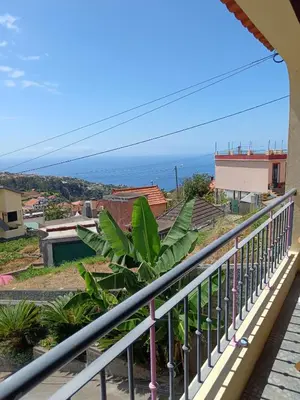 a balcony with a view of the ocean at Peaceful retreat near Levadas in Arco da Calheta