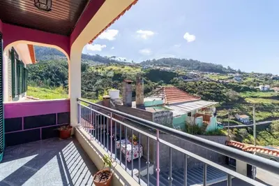 a balcony of a house with a view at Casa Central - Peceful Mountain Retreat in Calheta in Arco da Calheta