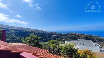 a view of the ocean from a house at Rustic Calheta House in Arco da Calheta