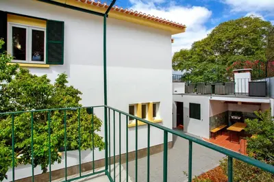 a view from the balcony of a house at Casa Caminho do Palheiro - Funchal in Funchal