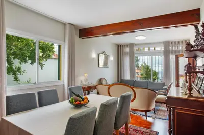 a dining room with a table and chairs at Casa Caminho do Palheiro - Funchal in Funchal