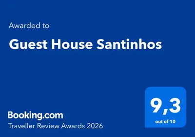 a screenshot of a guest house sattanooga with the text upgraded to guest house at Guest House Santinhos in Estreito da Calheta