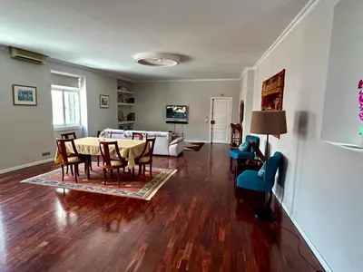 a living room with a table and a couch at Apartment Minorca in Funchal