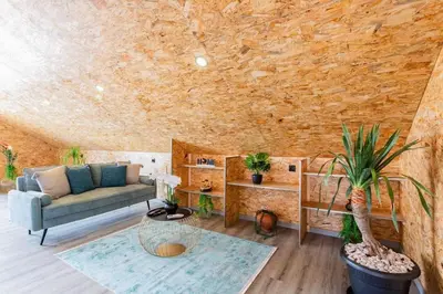 a living room with a couch and a table at Dona Maria - Tronco da Serra in Campanário