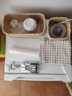 a table with a camera and a camera at Casa da Cabana in Budens