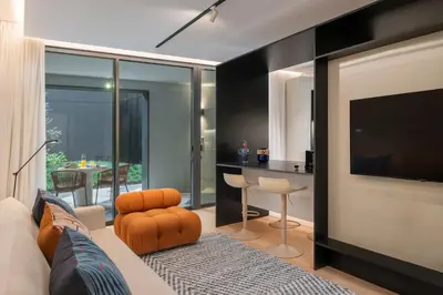 a house with a garden in front of it at Luxury Garden Apartment at Savoy Insular in Funchal