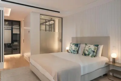a bathroom with a sink and a shower at Luxury Garden Apartment at Savoy Insular in Funchal