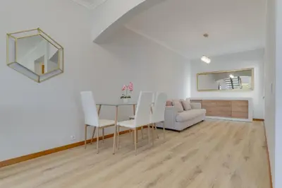 a living room with a table and a couch at Villa Quinta Grande by Holiday rental Madeira in Quinta Grande
