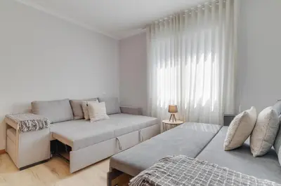 a living room with a couch and a bed at Villa Quinta Grande by Holiday rental Madeira in Quinta Grande