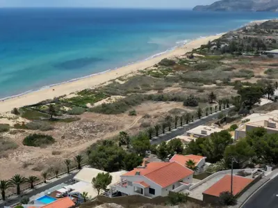 an aerial view of a beach and a house at Porto Santo Precious Oceanview in Campo de Baixo