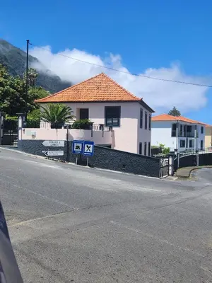a house on the side of a street at Oscar House Free Parking in São Vicente