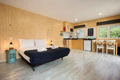 a bedroom with a large bed in a room at Casas Maravilha by Homie in Calheta
