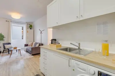 a bedroom with two beds and a window at Upgrade Paradise Apartments Funchal City Centre in Funchal