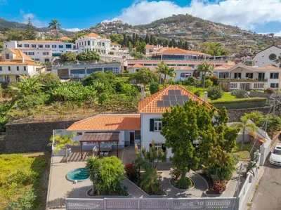an aerial view of a city with houses at Casa Trollis by Holiday Rental Madeira in Funchal
