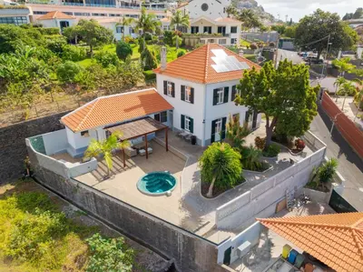 an aerial view of a white house with an orange roof at Casa Trollis by Holiday Rental Madeira in Funchal