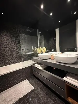 a large bathroom with two sinks and a tub at Zukiryo Seaside by Rentallido in Funchal