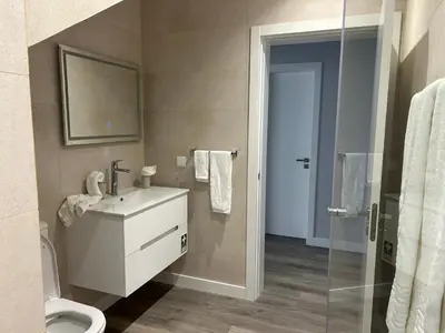 a bathroom with a sink and a toilet at Villa Diogo in Ponta do Sol