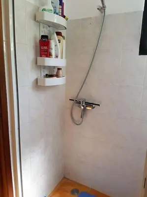 a shower in a bathroom with a shower at House in Camara de Lobos in Estreito de Câmara de Lobos