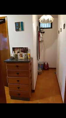 a room with a dresser and a hallway at House in Camara de Lobos in Estreito de Câmara de Lobos