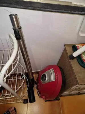 a kitchen counter with a fan and utensils at House in Camara de Lobos in Estreito de Câmara de Lobos