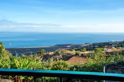 a view of the ocean from a hill at Refugio Dourado in Água de Pena
