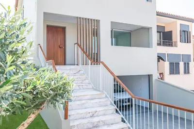 a staircase in a house with plants at Diogo House - view Funchal in Funchal