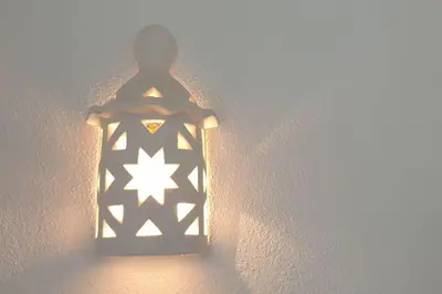 a light on a wall with a star on it at 3 bedroom Beach House in Luz in Luz