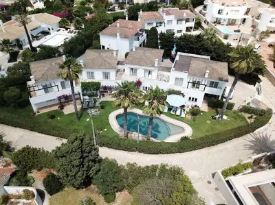 an aerial view of a house with a swimming pool at 3 bedroom Beach House in Luz in Luz