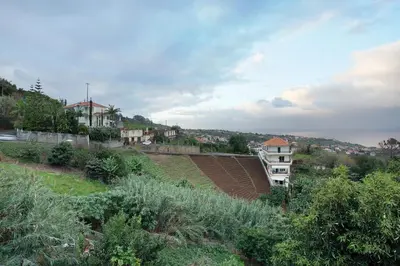 a view of a city with houses and a building at Luci's House in São Jorge