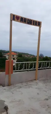 a sign that says accept on top of a building at Luci's House in São Jorge