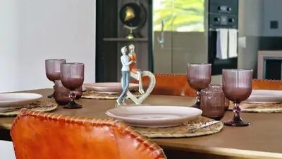 a table with a figurine of a woman on it at Lux Suite by LovelyStay in Funchal