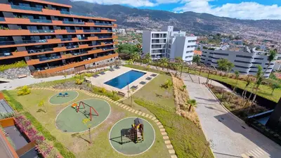 an overhead view of a park with a pool and playground at Lux Suite by LovelyStay in Funchal