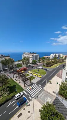 an aerial view of a city street with the ocean at Sunset Sea View in Funchal