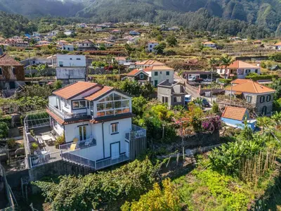 an aerial view of a small town with houses at Landure by Homie in São Vicente