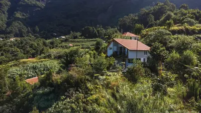 a house on the side of a mountain at Mountain Retreat - ZemBica by Atlantic Holiday in São Vicente