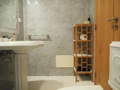 a bathroom with a sink and a shower at Camacho Residence in Funchal