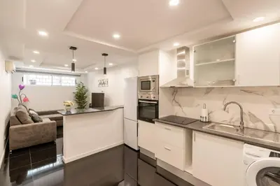 a kitchen with a sink and a counter top at Tranquilidade, Quiet Apartament in Funchal City Center in Funchal