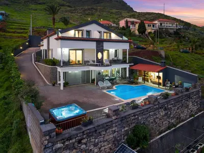 an aerial view of a house with a swimming pool at São Lourenço Guest House in Caniçal