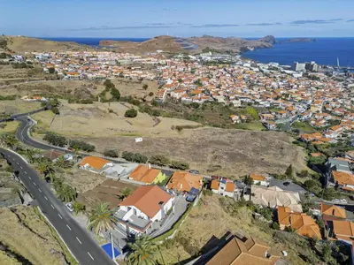 an aerial view of a town on a hill at São Lourenço Guest House in Caniçal