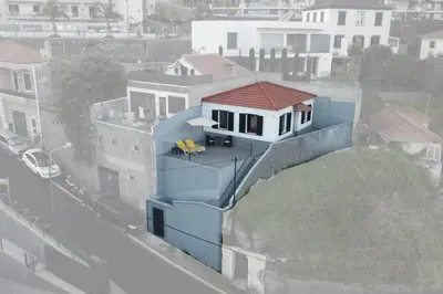 a house that is sitting on top of a building at Casa das Virtudes by Mth in Funchal