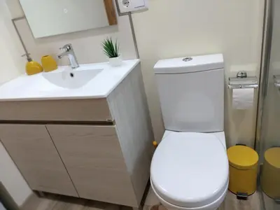 a bathroom with a toilet and a sink at Beautiful View 3 Arco da Calheta - Ilha da Madeira in Arco da Calheta