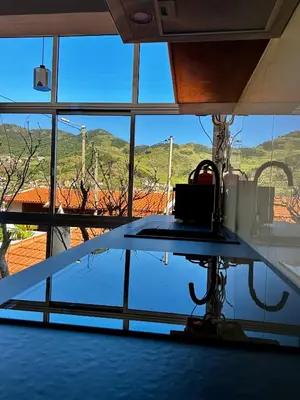 a view of a room with a large window at K&K Apartments in Machico