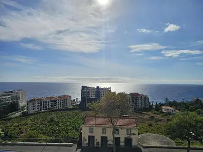 a view of the ocean from a city with buildings at Vista Mar Forum by Rentallido in Funchal